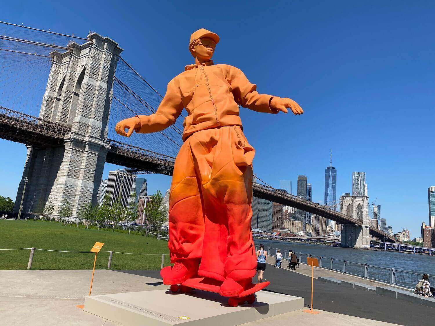 Orange skateboarder statue