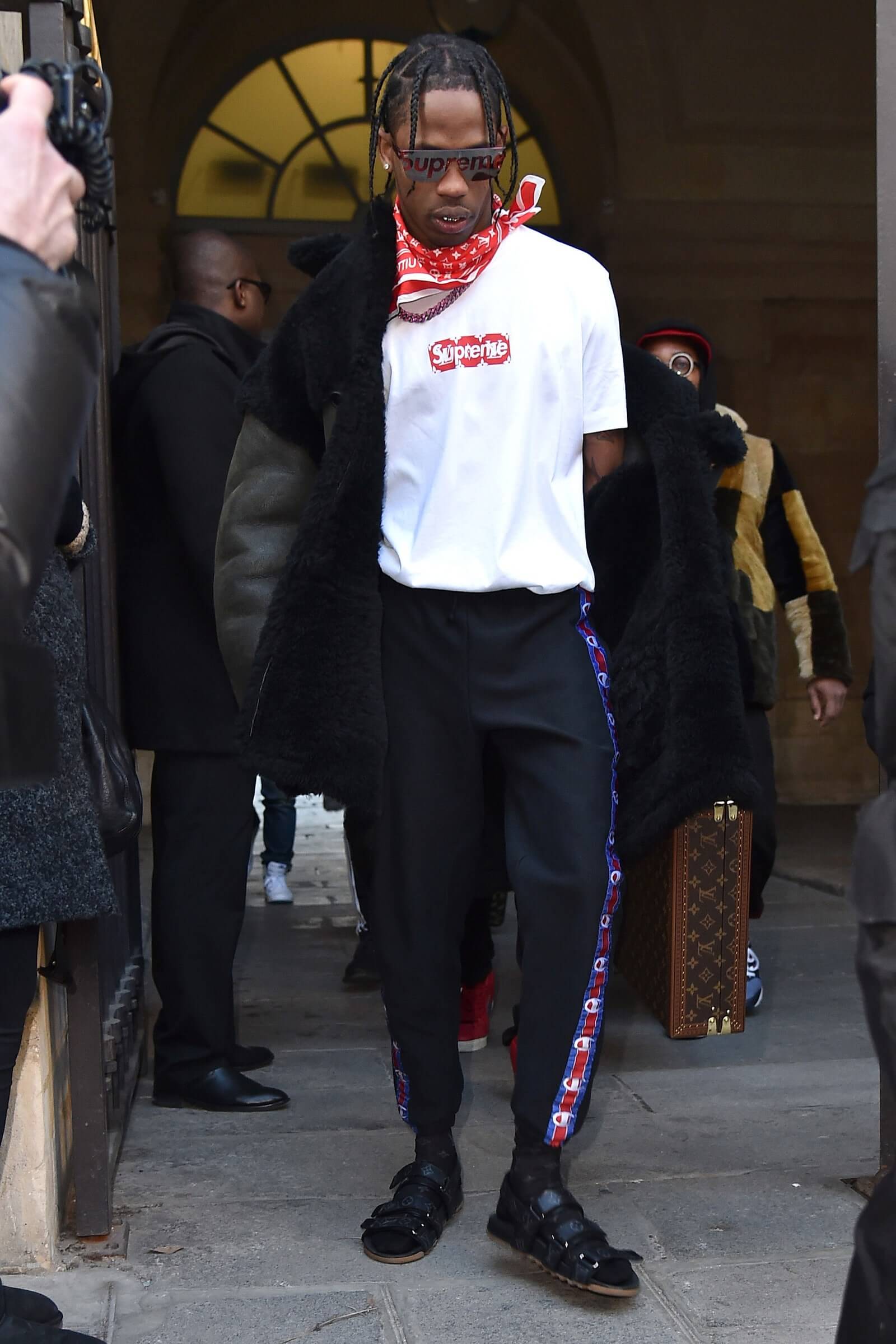 Travis Scott wearing Supreme