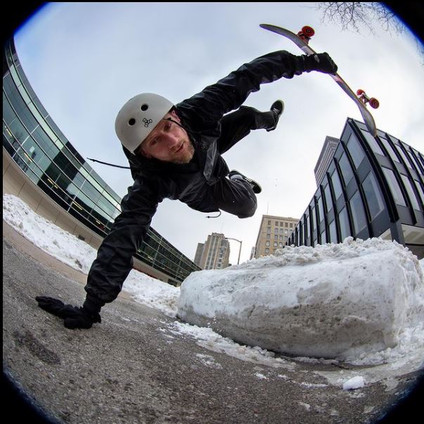 Mike Vallely skating with a helmet