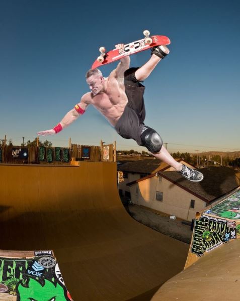 Cena Skates without a helmet skating a vert ramp