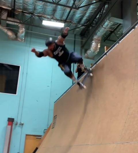 Big SC Boy drop in on a vert ramp