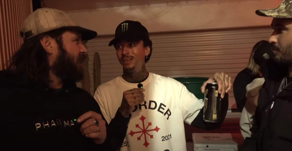Nyjah Huston talking to skaters