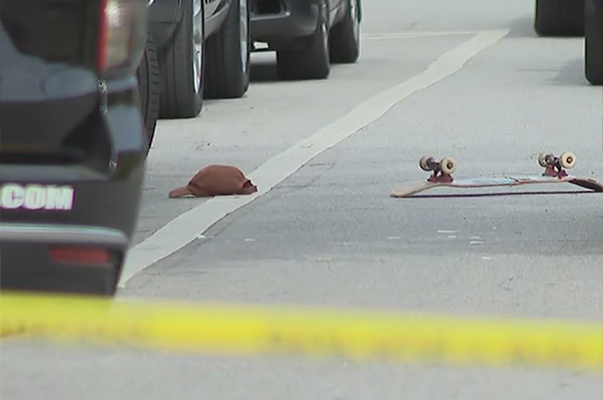 Skateboarder hit by a car