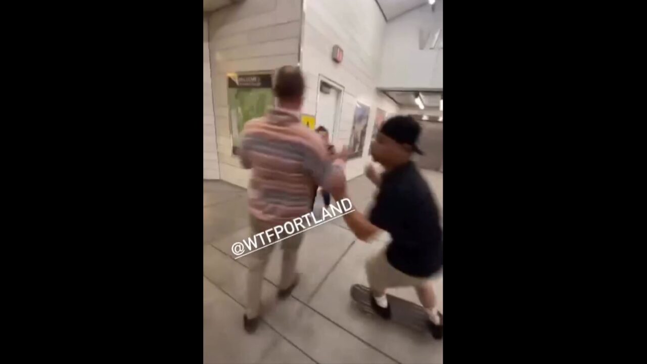 Skateboarders fighting robber