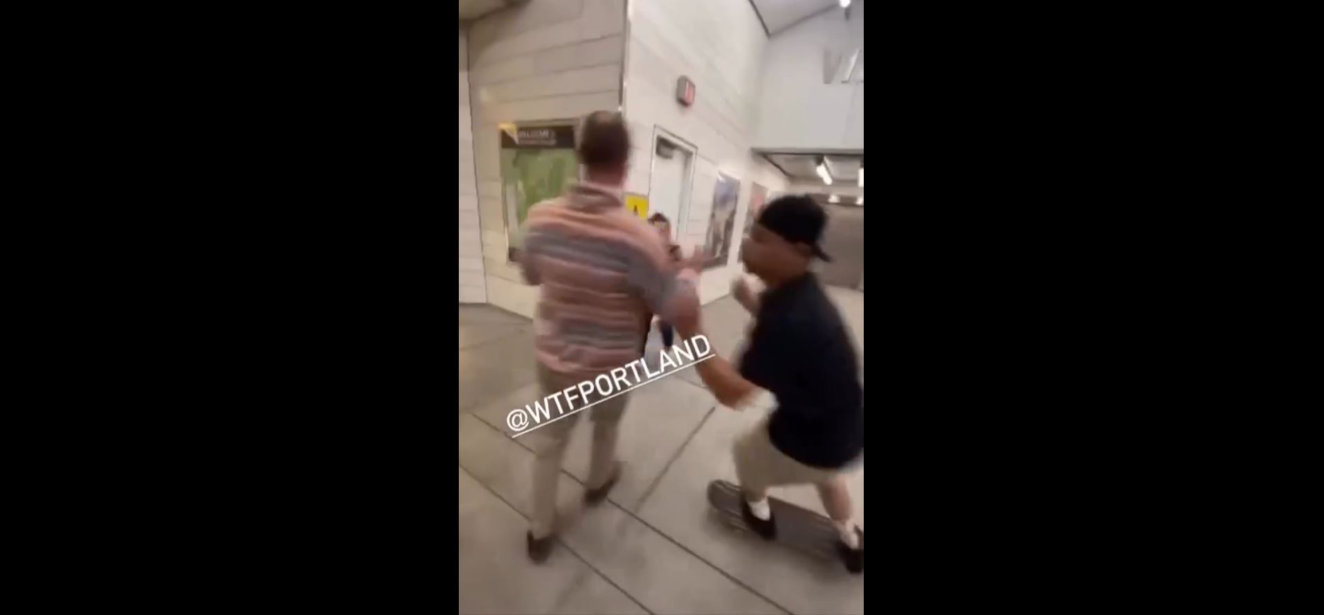 Skateboarders fighting robber