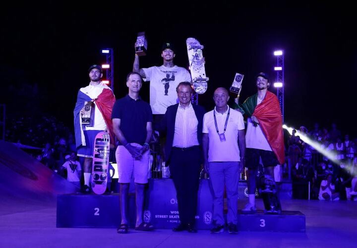 Skateboarding Olympians with corporate executives