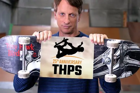 Tony Hawk holding a board