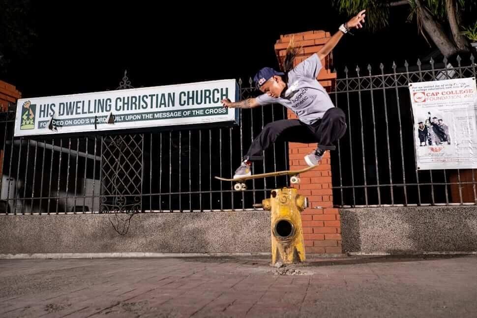 Margie Didal Ollie over a fire hydrant